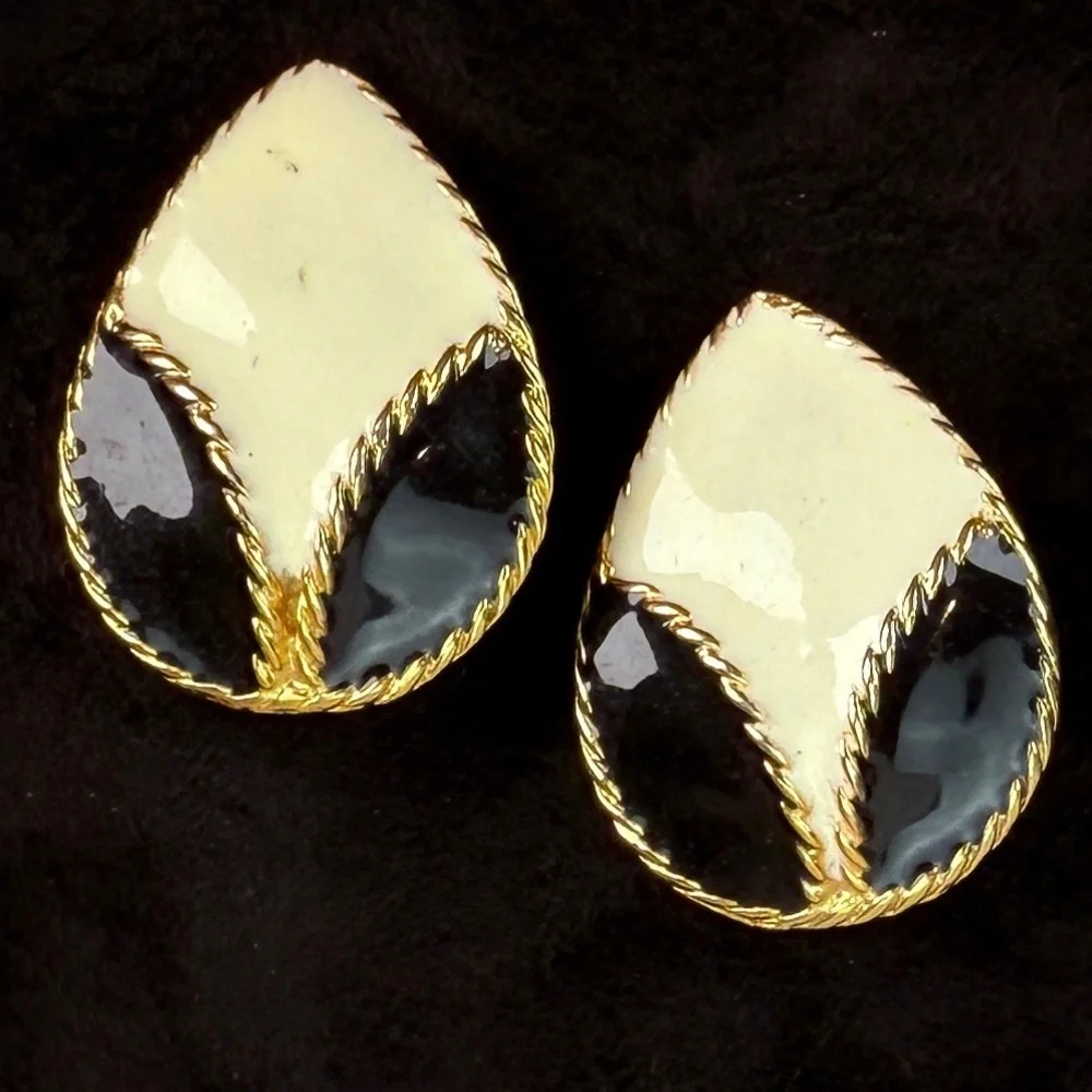 Vintage goldtone, black and cream enamel clip on earrings